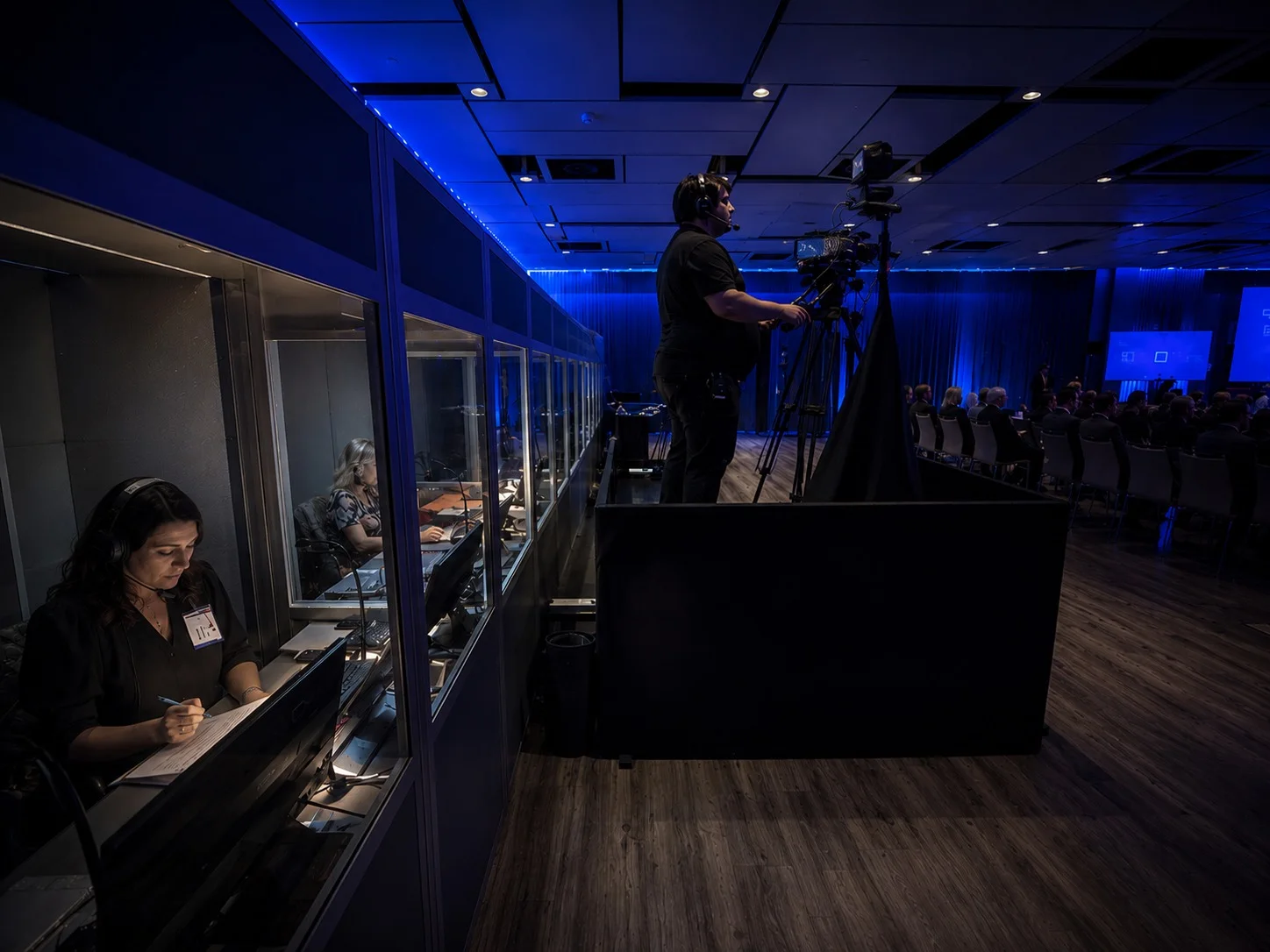 Camera platform and interpretation booths supporting a live conference room